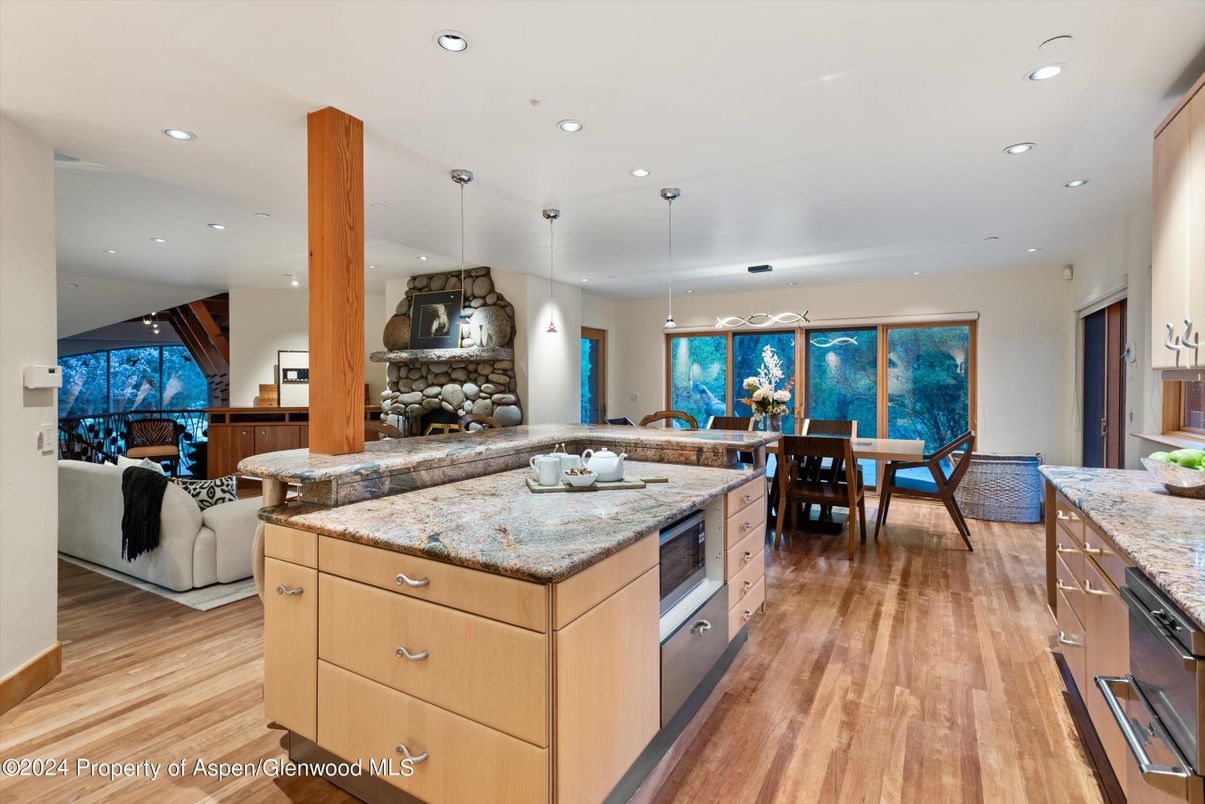 Dining room, Fireplace, Interior, Kitchen, Living room, Pendant Lights, Recessed Lighting, Wood Texture Flooring