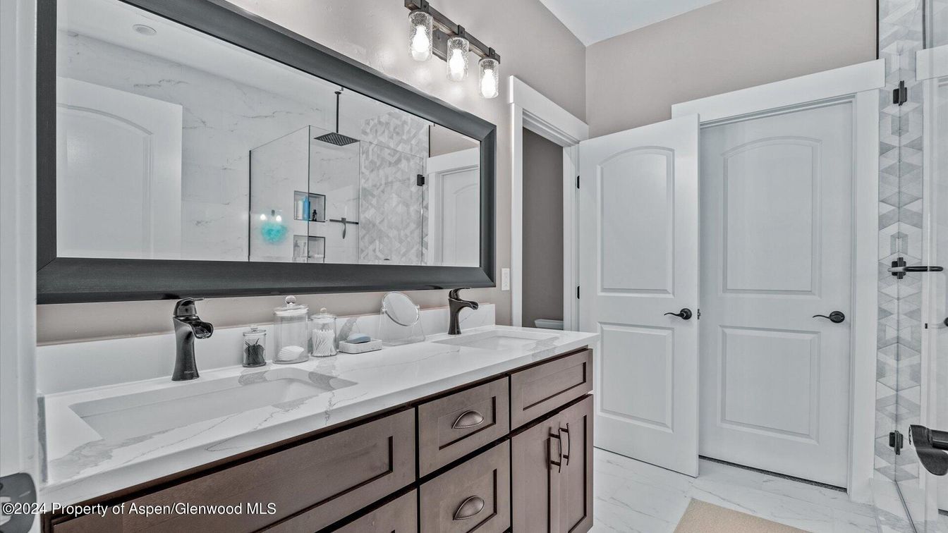 Bathroom, Dual Sink Vanities, Glass Shower, Interior, Marble, Marble Walls
