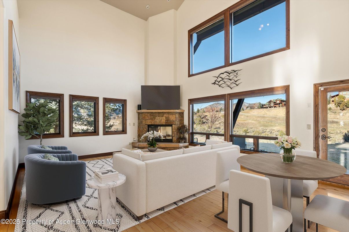 Dining room, Fireplace, Interior, Living room, Recessed Lighting, Wood Texture Flooring