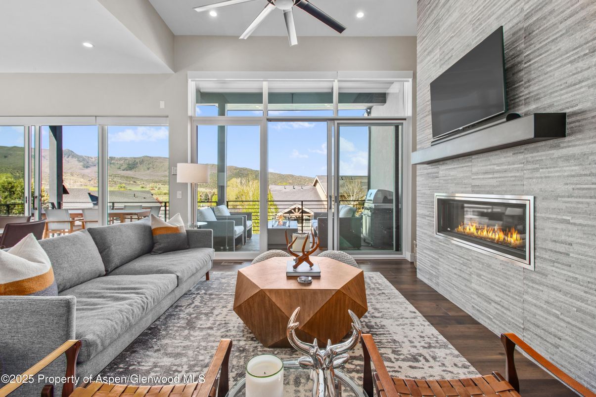 Fireplace, Interior, Living room, Recessed Lighting, Water, Wood Texture Flooring