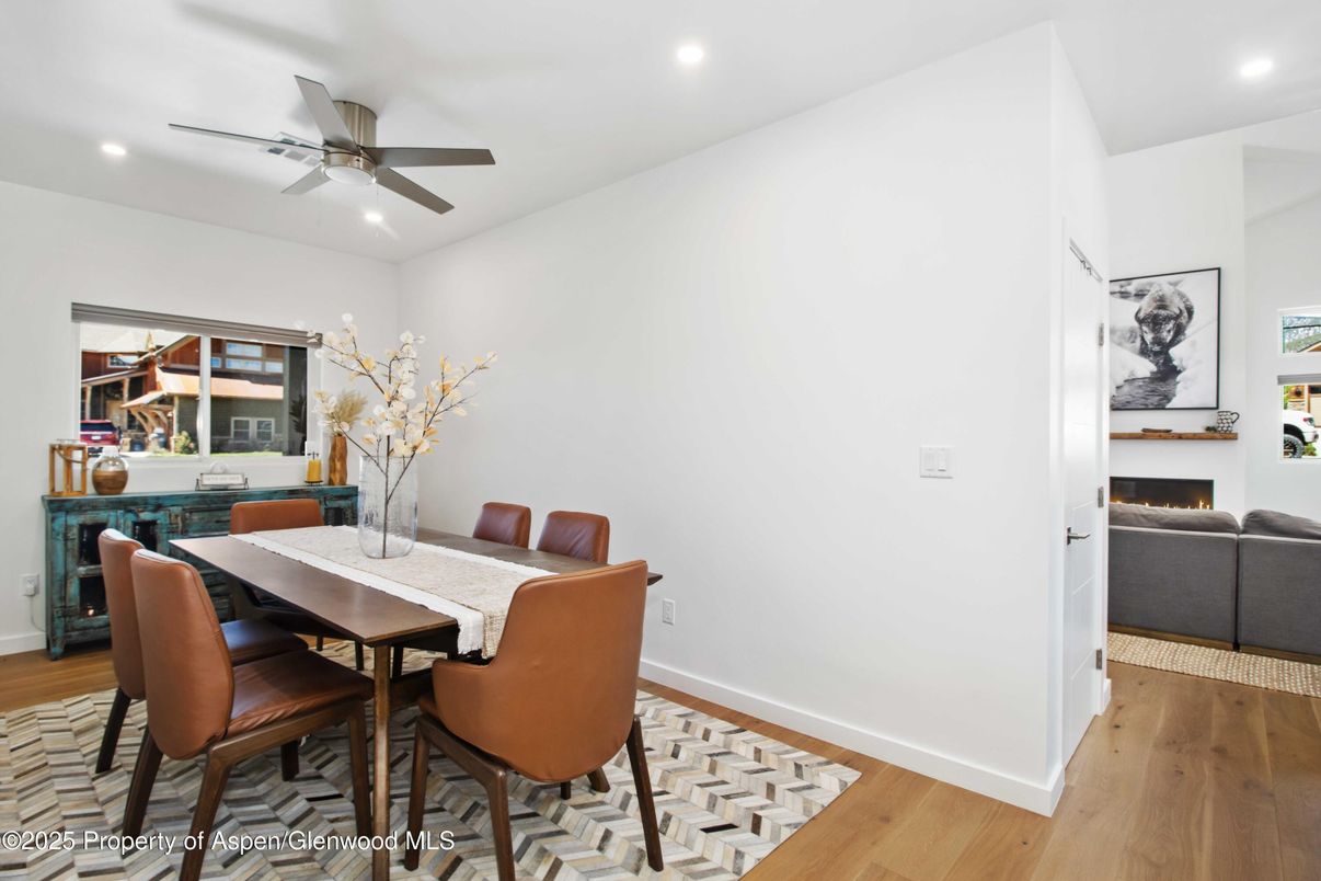 Dining room, Fireplace, Interior, Recessed Lighting, Wood Texture Flooring