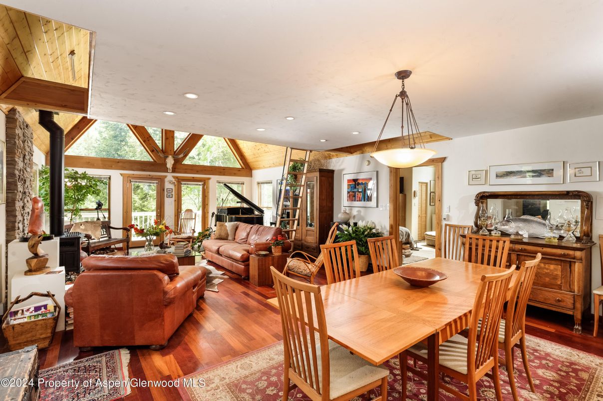 Dining room, Fireplace, Interior, Living room, Pendant Lights, Piano, Recessed Lighting, Wood Texture Flooring