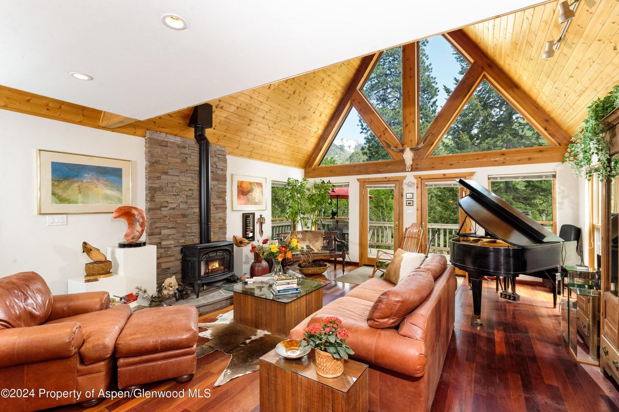 Fireplace, Interior, Living room, Piano, Recessed Lighting, Stone Walls, Wooden Ceilings, Wood Texture Flooring, Wooden Walls