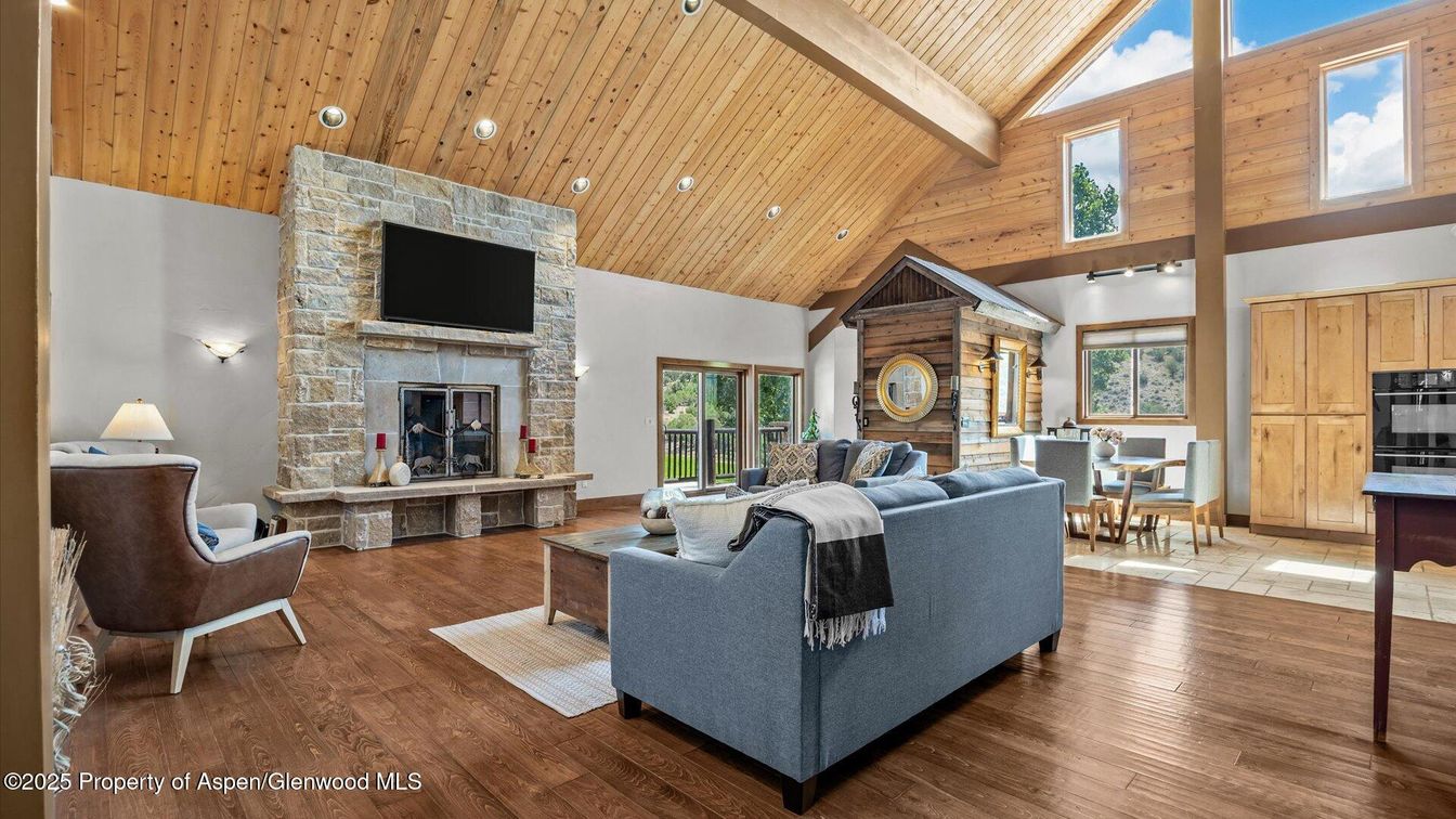 Dining room, Fireplace, Interior, Living room, Recessed Lighting, Stone Walls, Wooden Beams, Wooden Ceilings, Wood Texture Flooring, Wooden Walls