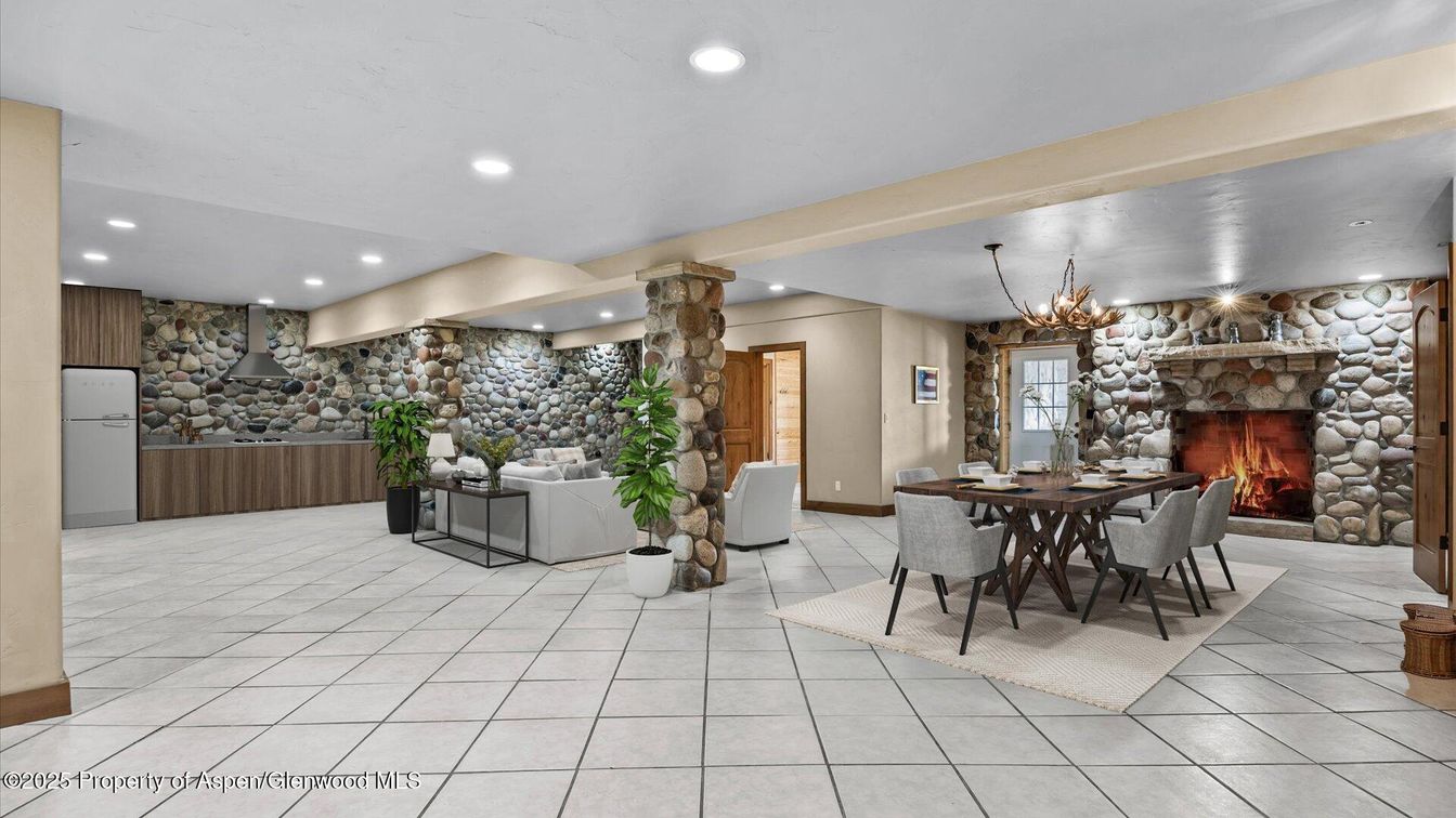 Chandelier, Dining room, Fireplace, Interior, Living room, Recessed Lighting, Stone Walls
