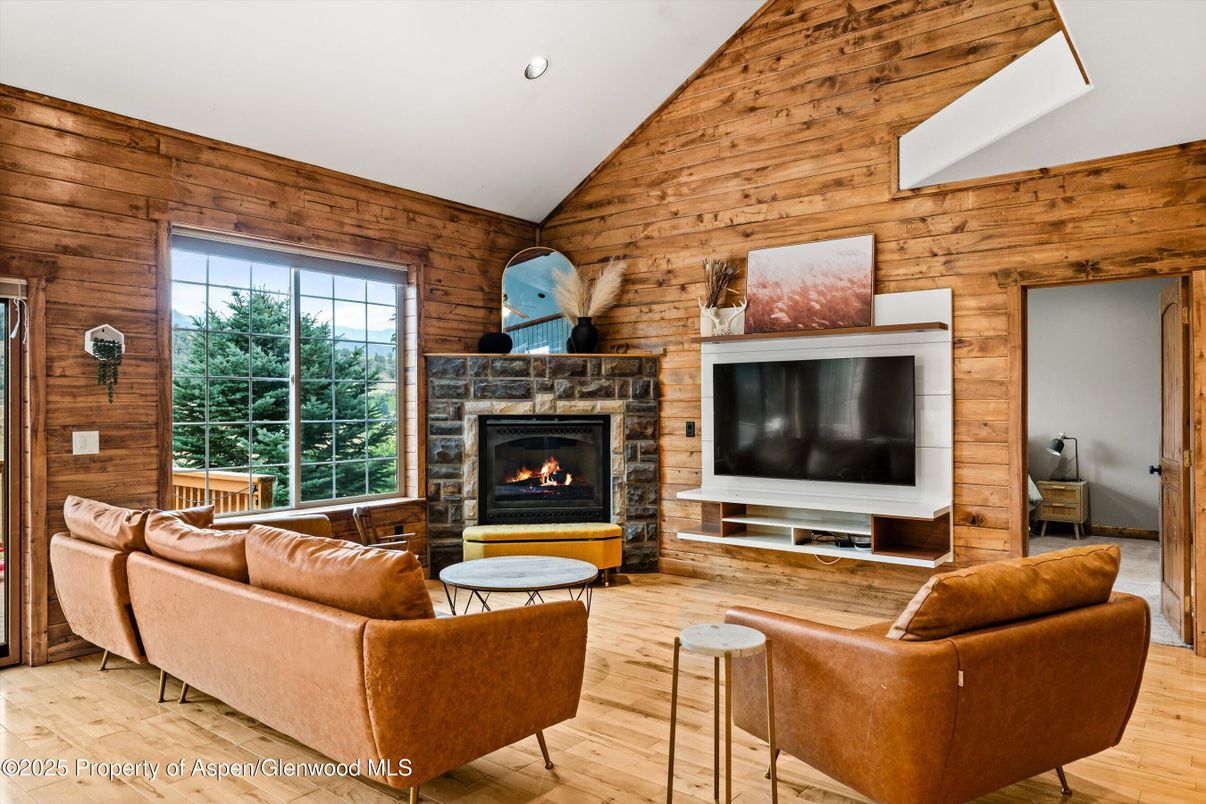 Fireplace, Interior, Living room, Recessed Lighting, Wood Texture Flooring, Wooden Walls