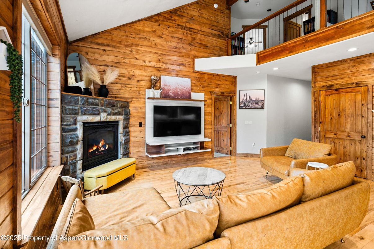 Fireplace, Interior, Living room, Recessed Lighting, Wood Texture Flooring, Wooden Walls