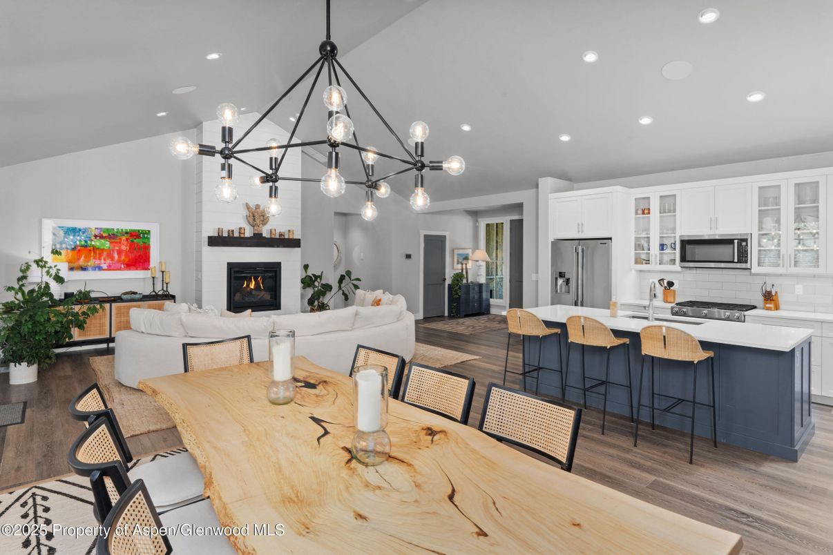 Dining room, Fireplace, Interior, Kitchen, Living room, Pendant Lights, Recessed Lighting, Stainless Steel Appliances, Wood Texture Flooring