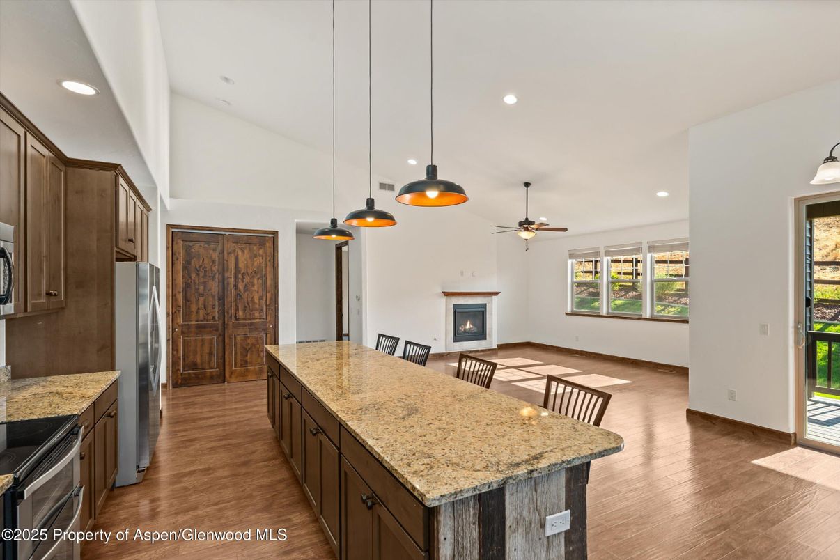 Fireplace, Interior, Kitchen, Pendant Lights, Recessed Lighting, Wood Texture Flooring