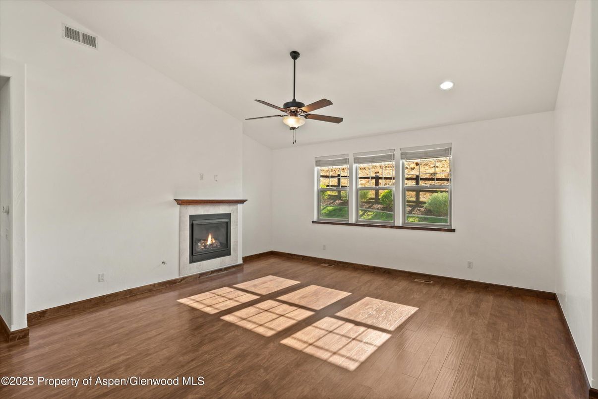 Empty room, Fireplace, Interior, Recessed Lighting, Wood Texture Flooring