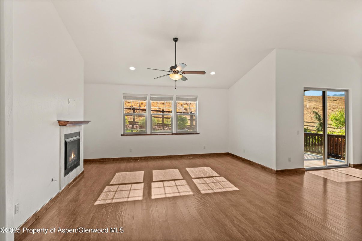 Empty room, Fireplace, Interior, Recessed Lighting, Wood Texture Flooring