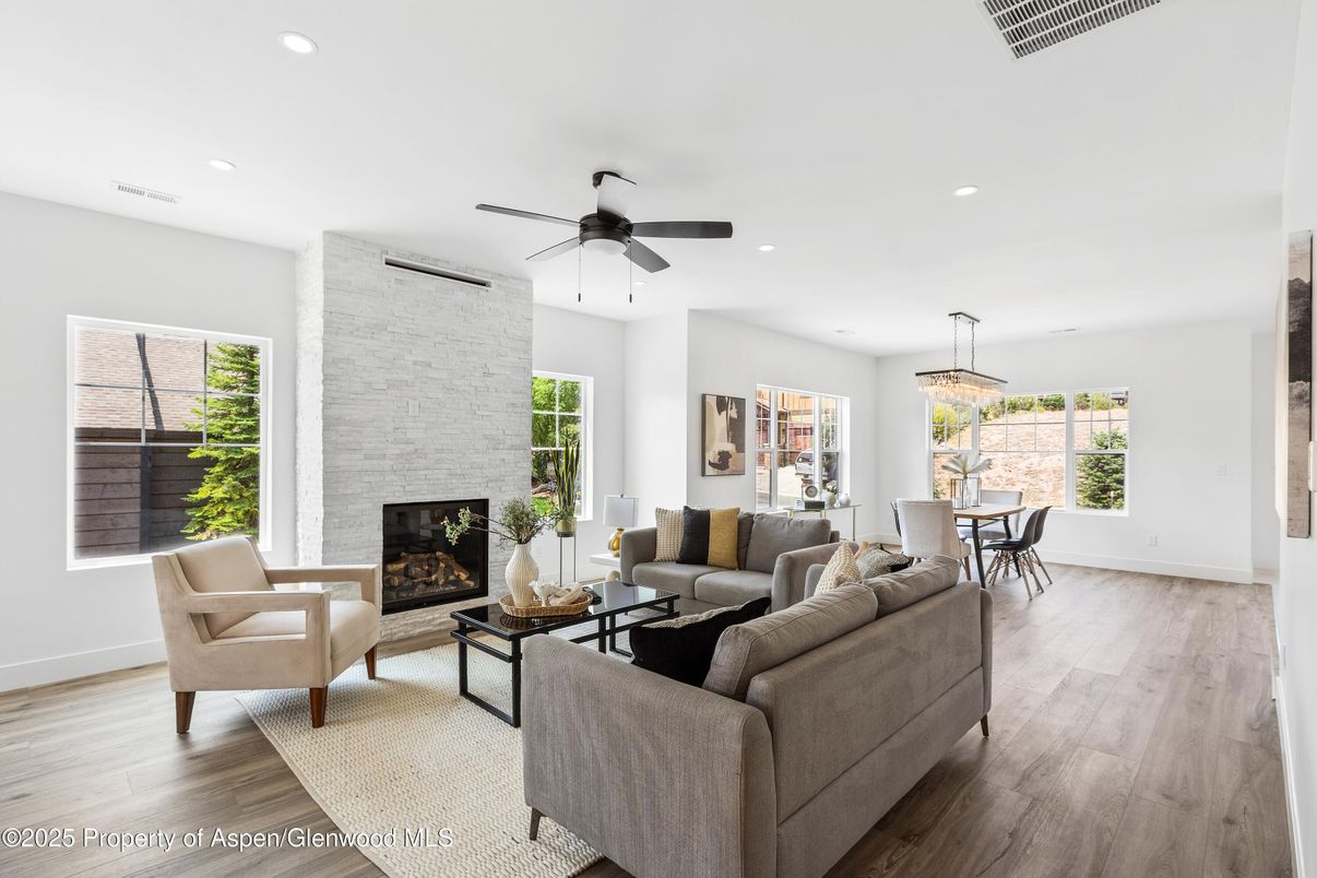 Dining room, Fireplace, Interior, Living room, Pendant Lights, Recessed Lighting, Stone Walls, Wood Texture Flooring