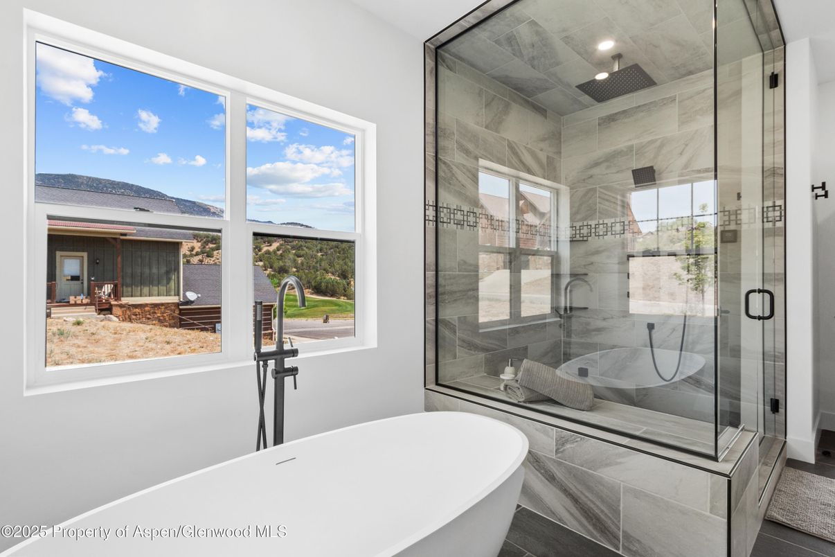 Bathroom, Free Standing Baths, Glass Shower, Interior, Marble Walls, Recessed Lighting, Water