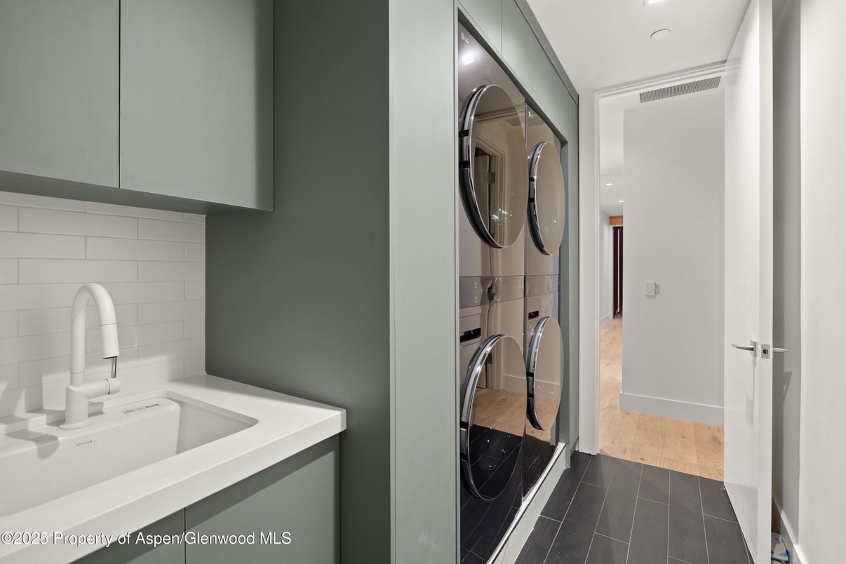 Bathroom, Interior, Recessed Lighting, Washer, Wood Texture Flooring