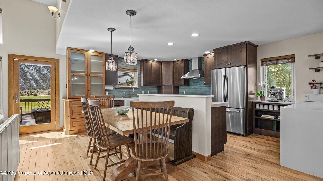 Dining room, Interior, Kitchen, Pendant Lights, Recessed Lighting, Stainless Steel Appliances, Wood Texture Flooring