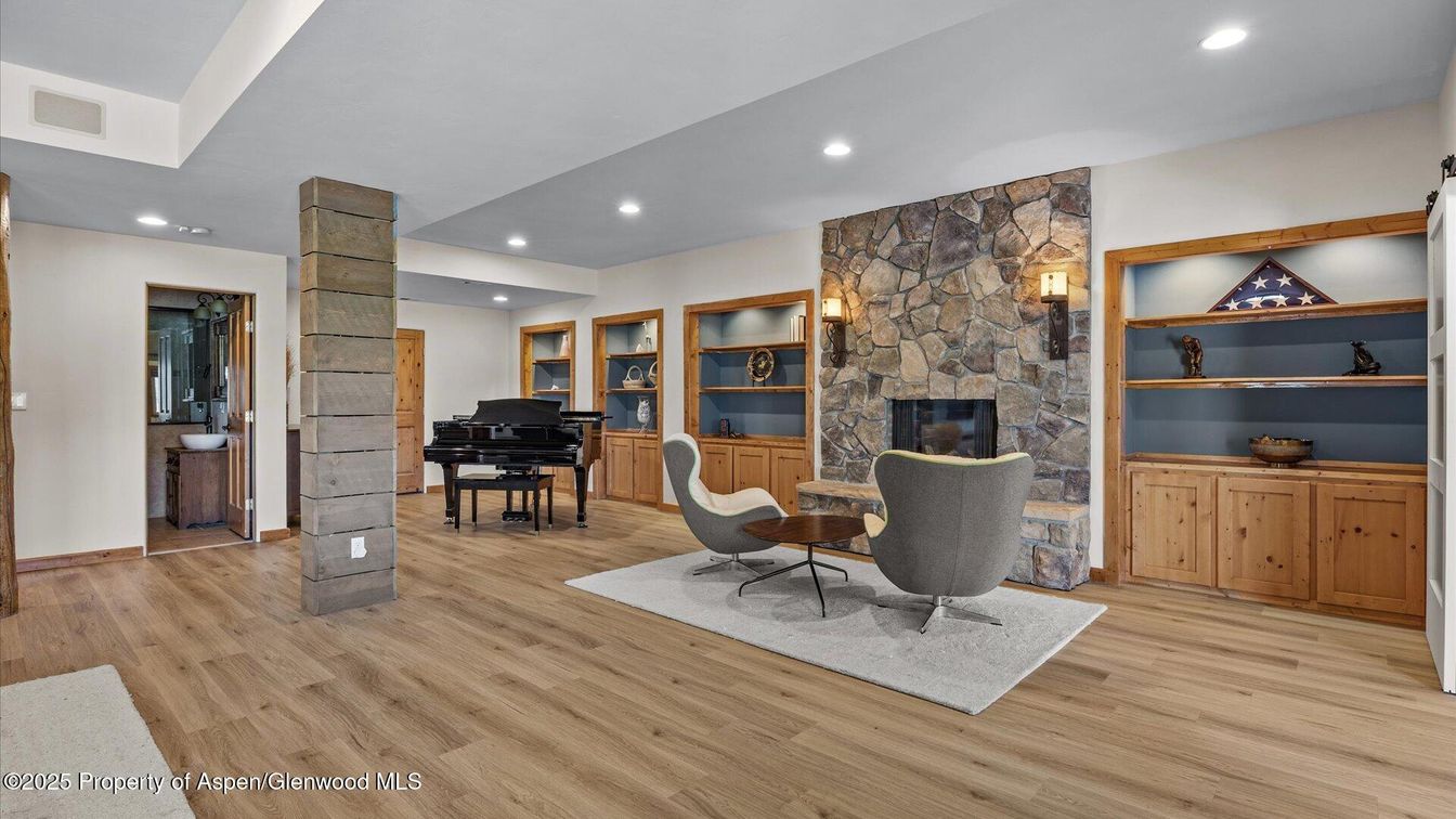 Fireplace, Interior, Piano, Recessed Lighting, Stone Walls, Wood Texture Flooring