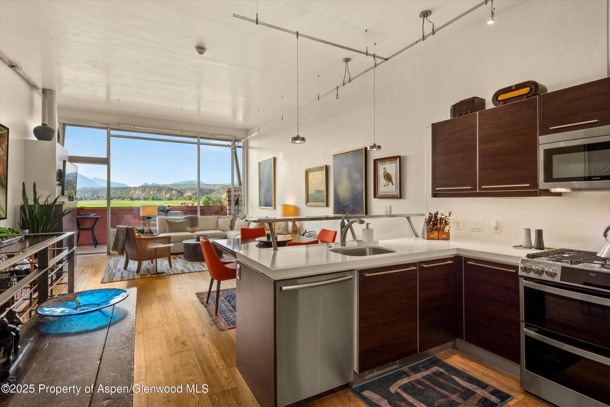 Dining room, Interior, Kitchen, Living room, Pendant Lights, Stainless Steel Appliances, Wood Texture Flooring