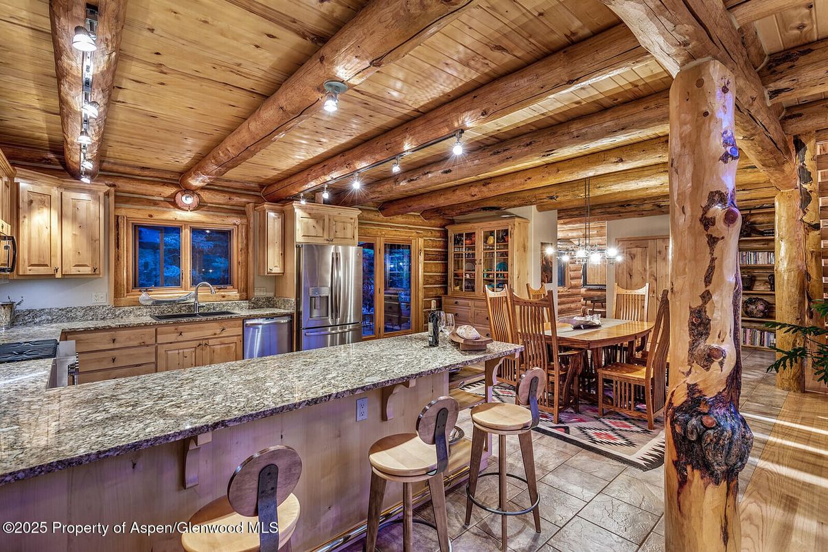 Chandelier, Dining room, Interior, Kitchen, Pendant Lights, Stainless Steel Appliances, Wooden Beams, Wooden Ceilings