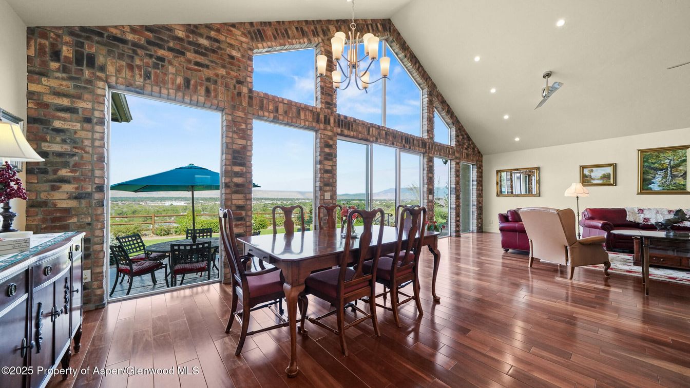 Chandelier, Dining room, Interior, Living room, Recessed Lighting, Stone Walls, Wood Texture Flooring