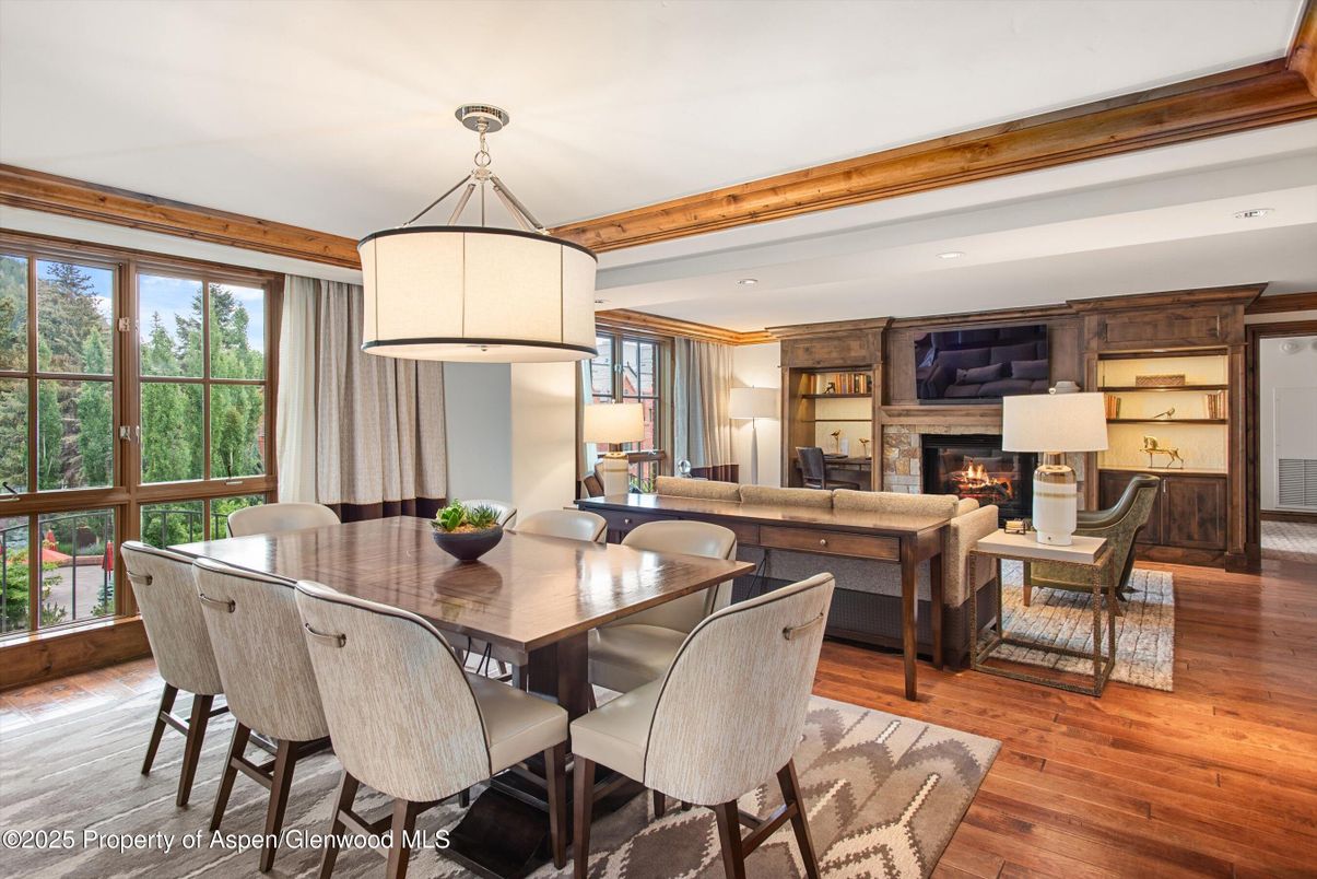 Dining room, Fireplace, Interior, Living room, Recessed Lighting, Wooden Beams, Wood Texture Flooring