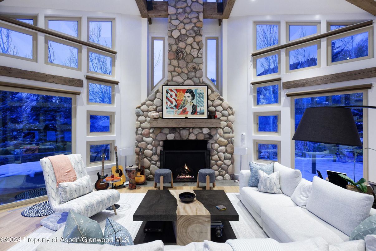 Fireplace, Interior, Living room, Recessed Lighting, Stone Walls, Wood Texture Flooring