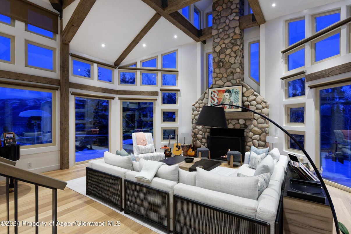 Fireplace, Interior, Living room, Recessed Lighting, Stone Walls, Wooden Beams, Wood Texture Flooring