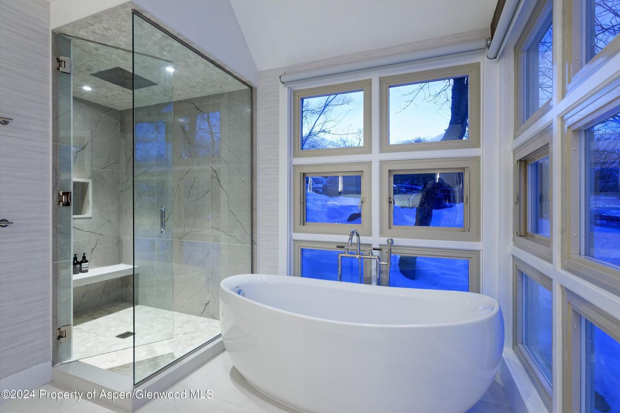 Bathroom, Free Standing Baths, Glass Shower, Interior, Marble Walls, Recessed Lighting