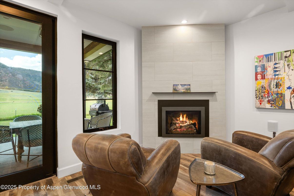 Fireplace, Interior, Living room, Recessed Lighting, Wood Texture Flooring