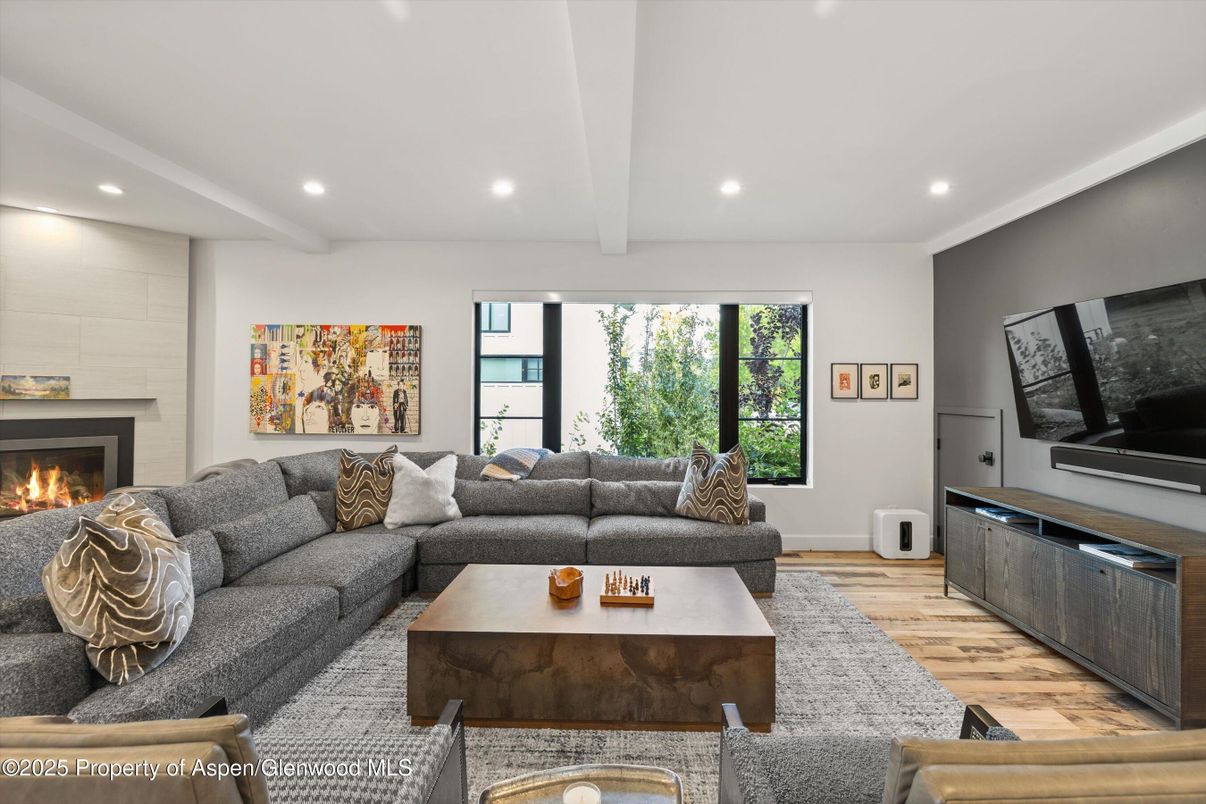 Fireplace, Interior, Living room, Recessed Lighting, Wood Texture Flooring