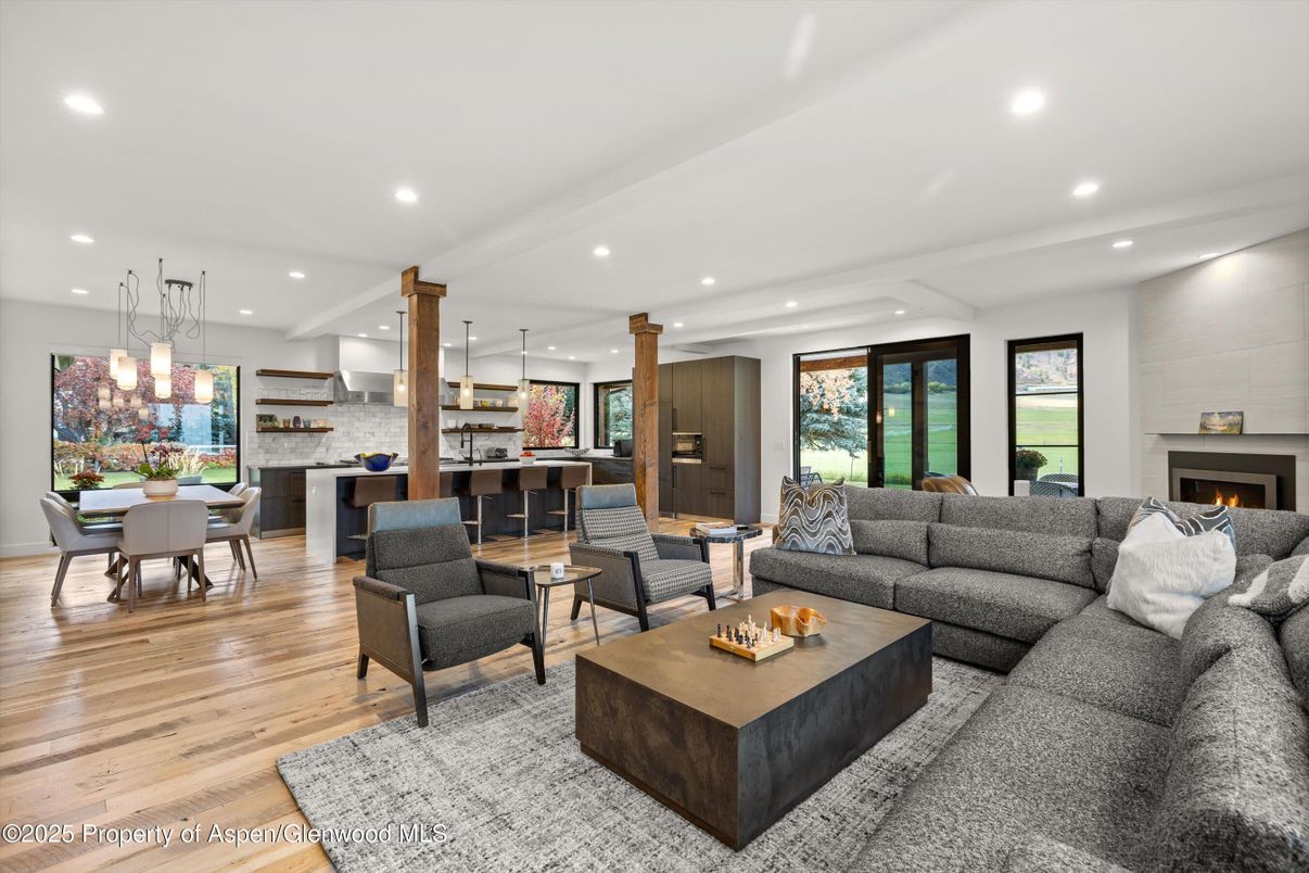 Dining room, Fireplace, Interior, Kitchen, Living room, Pendant Lights, Recessed Lighting, Stone Walls, Wood Texture Flooring