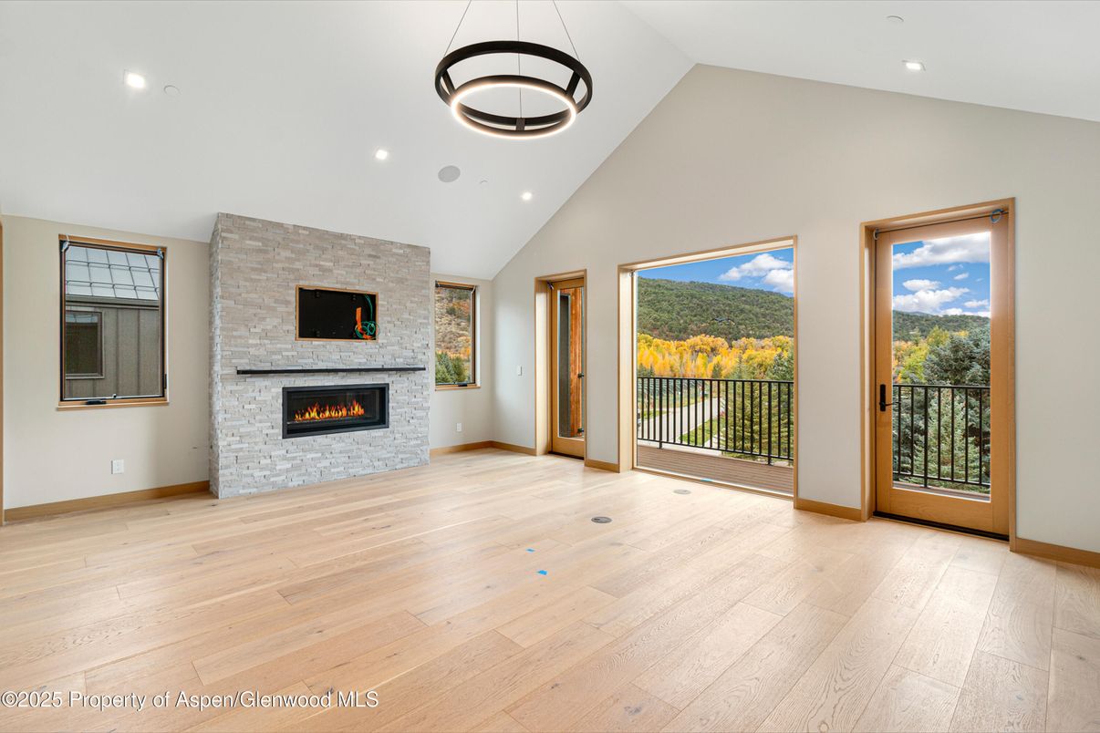 Empty room, Fireplace, Interior, Pendant Lights, Recessed Lighting, Wood Texture Flooring