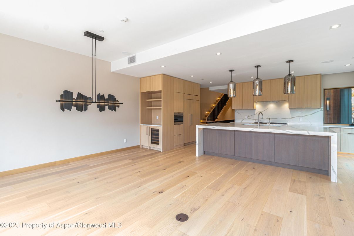 Interior, Kitchen, Pendant Lights, Recessed Lighting, Stainless Steel Appliances, Wood Texture Flooring