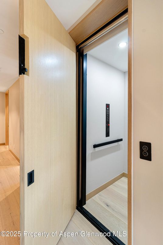 Elevator, Interior, Recessed Lighting, Wood Texture Flooring, Wooden Walls