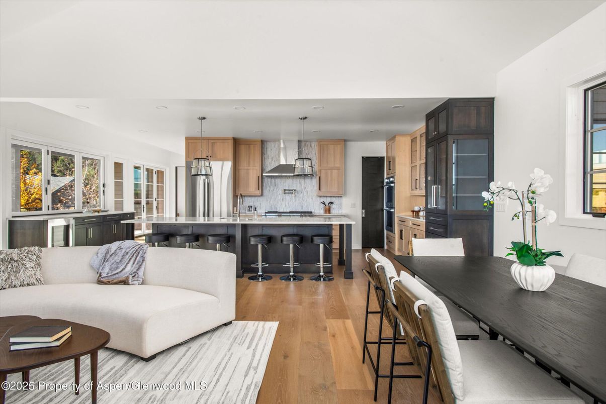 Dining room, Interior, Kitchen, Living room, Pendant Lights, Recessed Lighting, Stainless Steel Appliances, Wood Texture Flooring