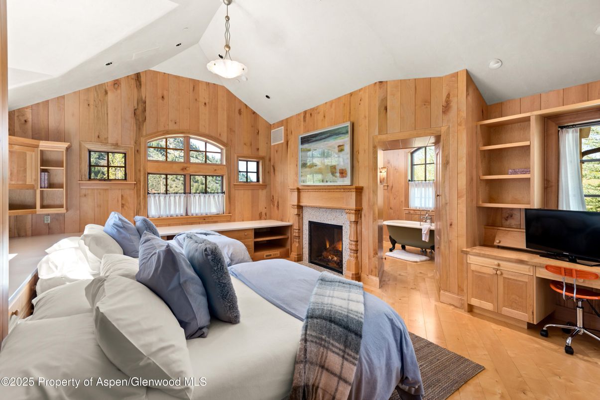 Bedroom, Fireplace, Home Office, Interior, Pendant Lights, Wood Texture Flooring, Wooden Walls