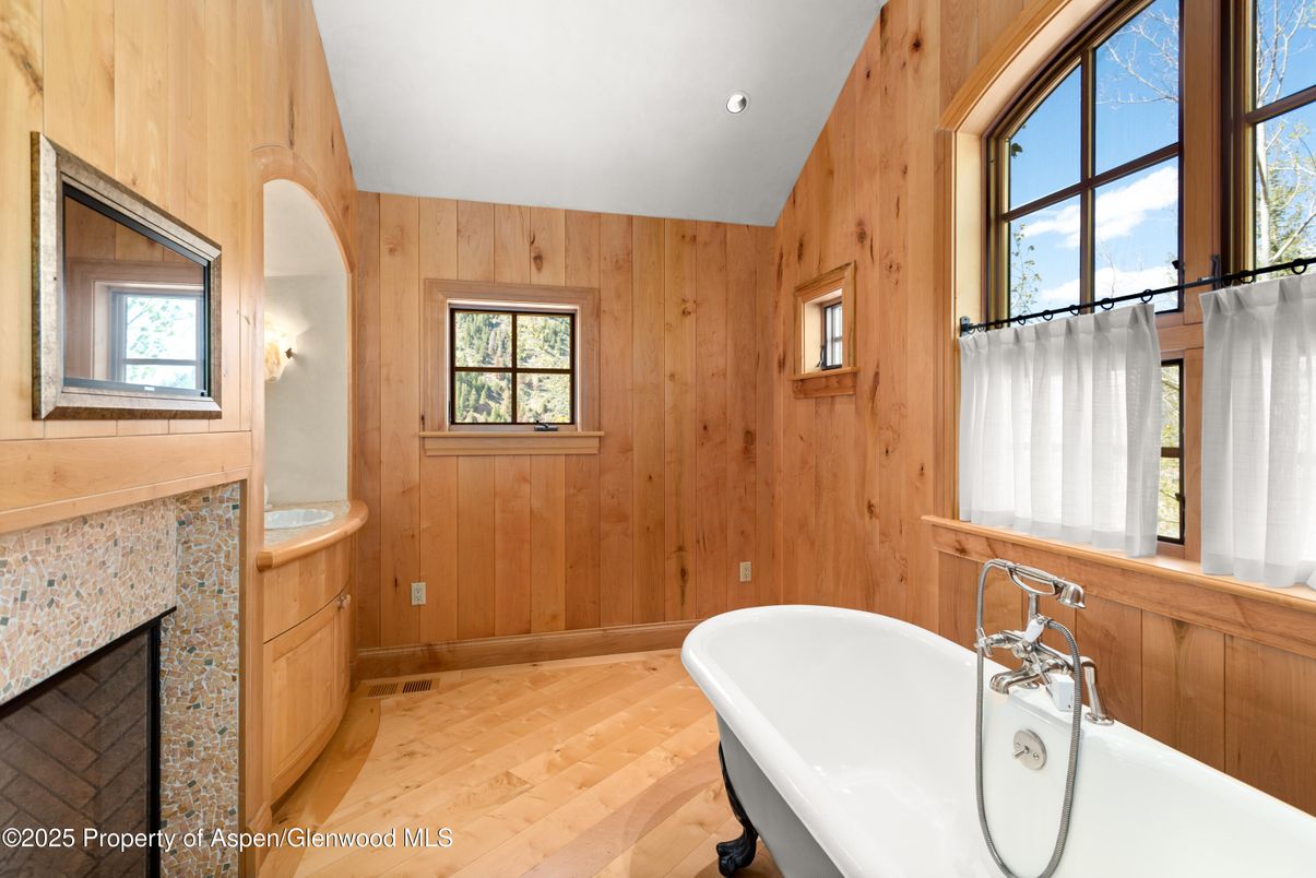 Bathroom, Free Standing Baths, Interior, Recessed Lighting, Wood Texture Flooring, Wooden Walls