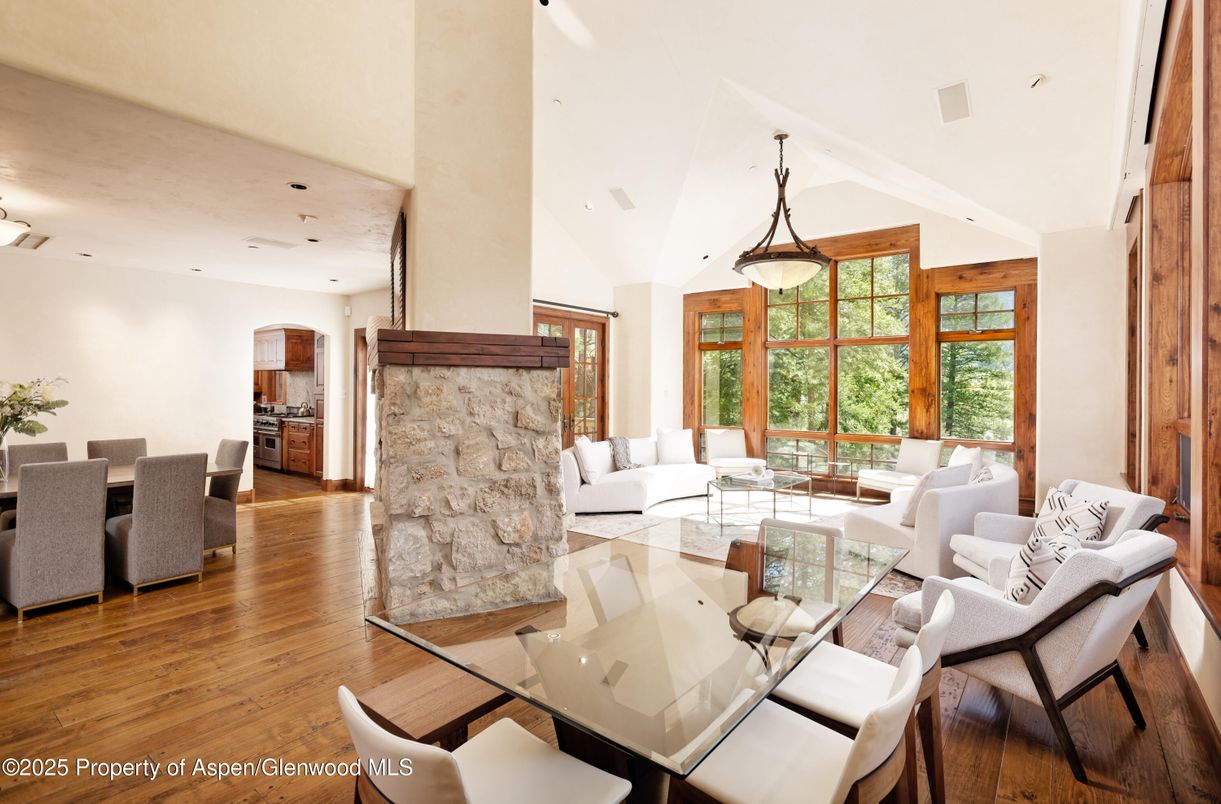 Dining room, Fireplace, Interior, Living room, Pendant Lights, Recessed Lighting, Wood Texture Flooring