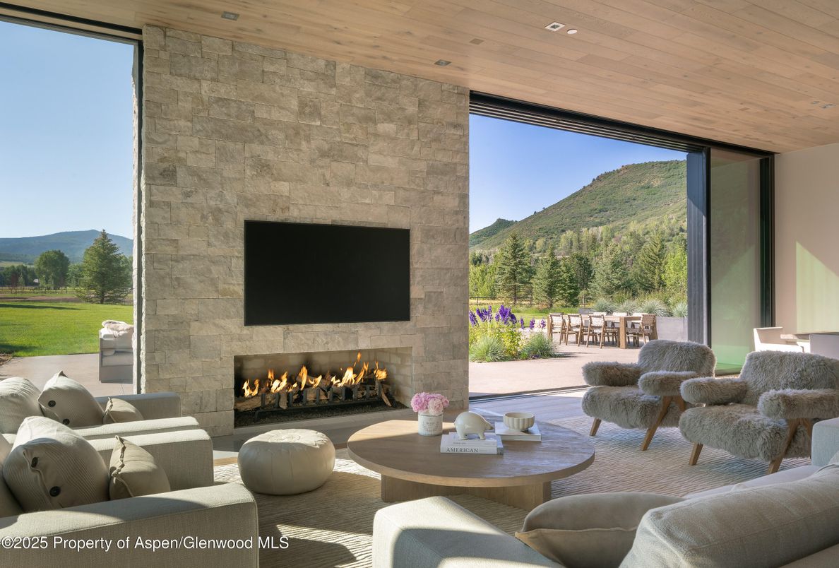 Fireplace, Interior, Living room, Recessed Lighting, Stone Walls, Wooden Ceilings