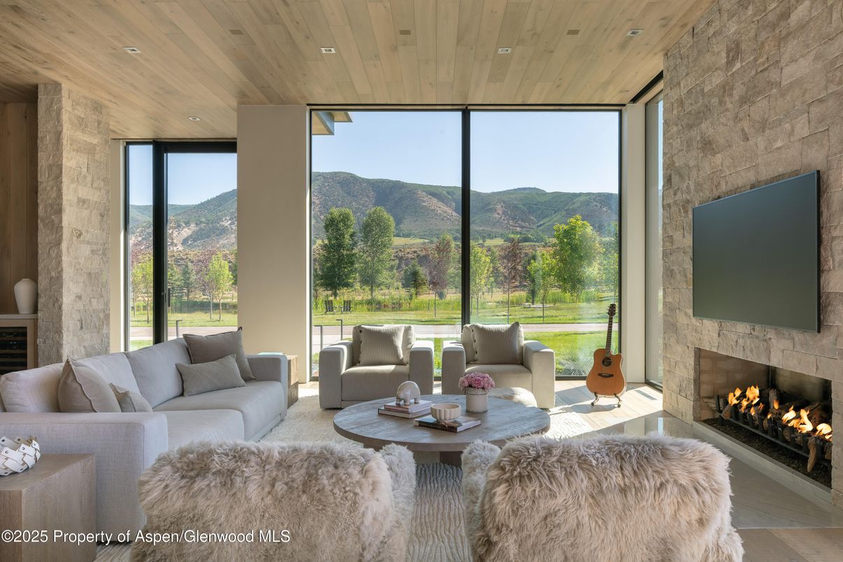 Fireplace, Interior, Living room, Recessed Lighting, Stone Walls, Wooden Ceilings