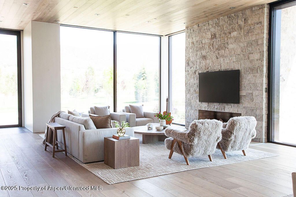 Fireplace, Interior, Living room, Recessed Lighting, Stone Walls, Wooden Ceilings, Wood Texture Flooring