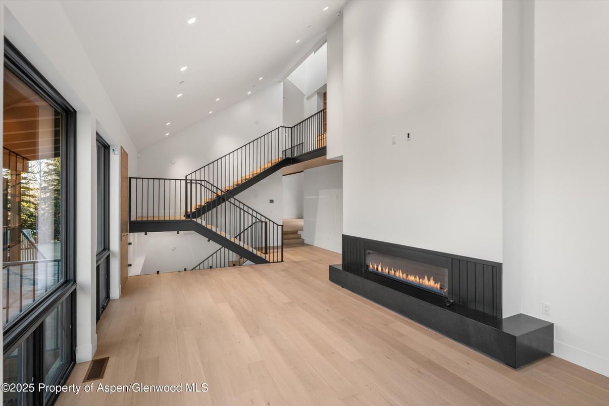 Fireplace, Interior, Recessed Lighting, Wood Texture Flooring