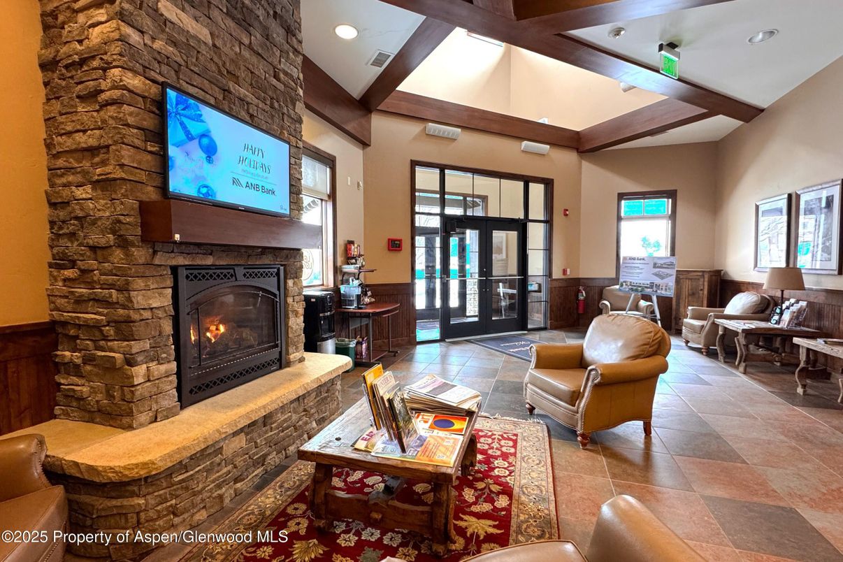 Fireplace, Interior, Living room, Recessed Lighting, Stone Walls, Wooden Beams