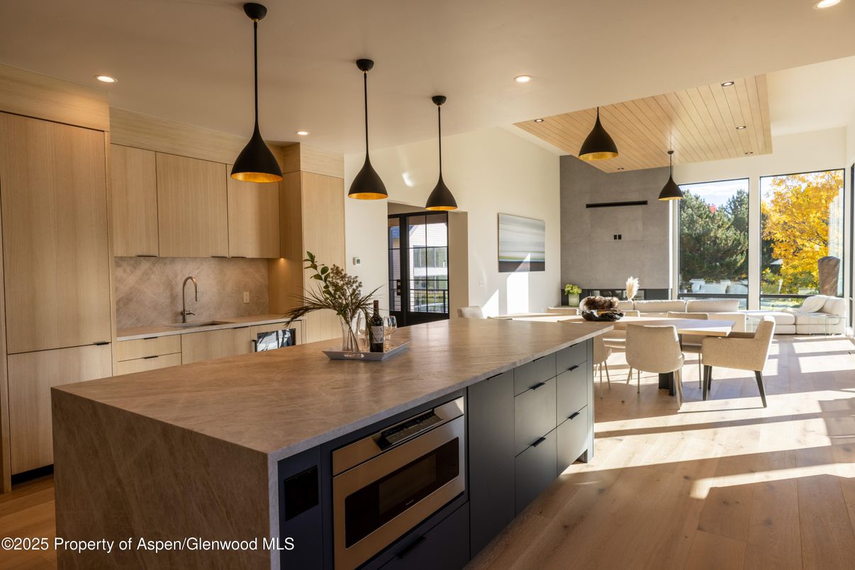 Dining room, Interior, Kitchen, Pendant Lights, Recessed Lighting, Stainless Steel Appliances, Wooden Ceilings, Wood Texture Flooring