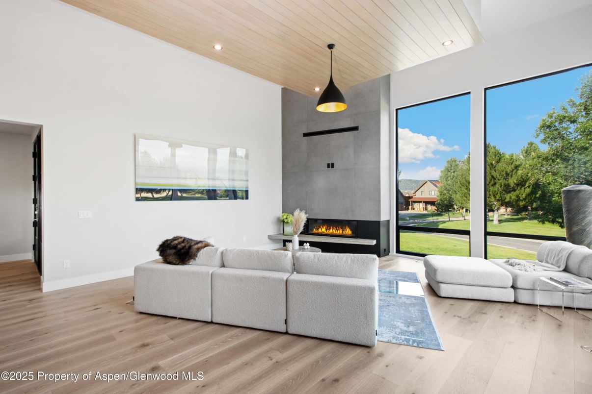 Fireplace, Interior, Living room, Pendant Lights, Recessed Lighting, Wooden Ceilings, Wood Texture Flooring