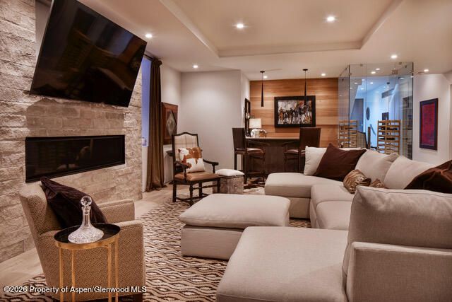 Dining room, Fireplace, Interior, Living room, Pendant Lights, Recessed Lighting, Stone Walls, Wooden Walls