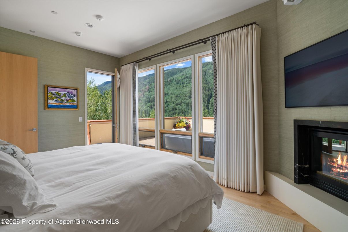 Bedroom, Fireplace, Interior, Recessed Lighting, Wood Texture Flooring