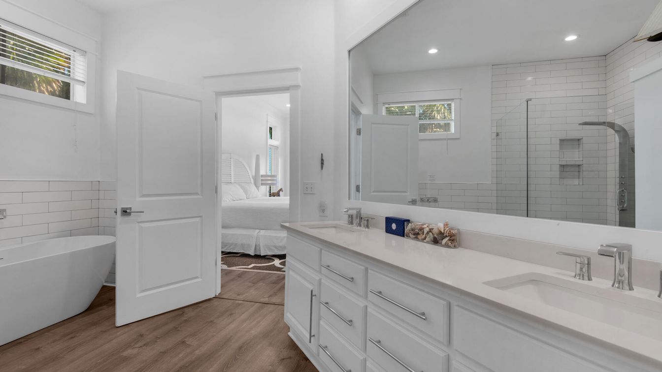 Bathroom, Bedroom, Dual Sink Vanities, Free Standing Baths, Glass Shower, Interior, Recessed Lighting, Wood Texture Flooring