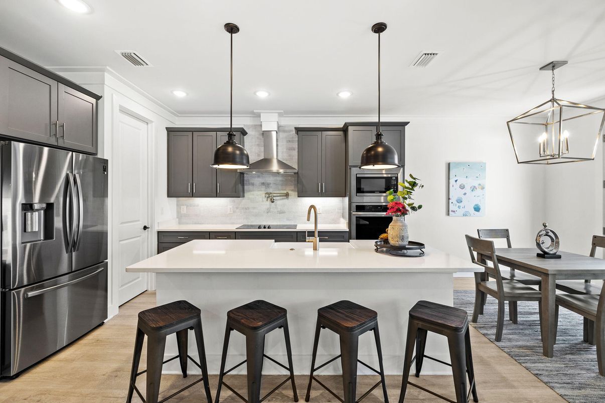 Dining room, Interior, Kitchen, Pendant Lights, Recessed Lighting, Stainless Steel Appliances, Wood Texture Flooring