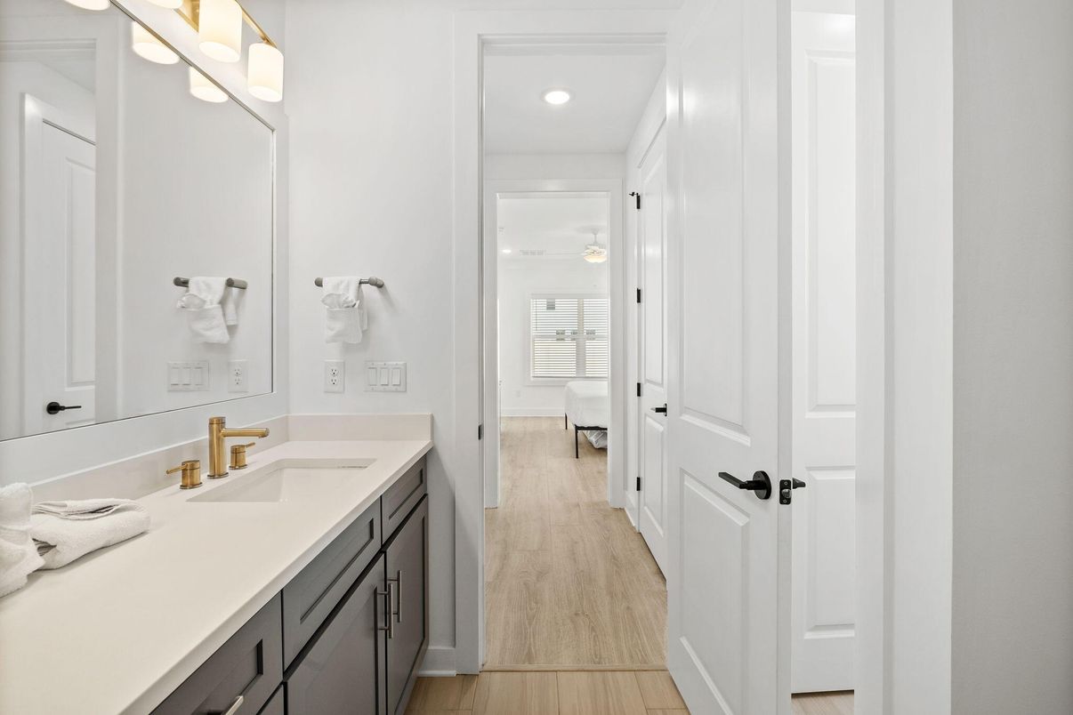 Bathroom, Dual Sink Vanities, Interior, Recessed Lighting, Wood Texture Flooring
