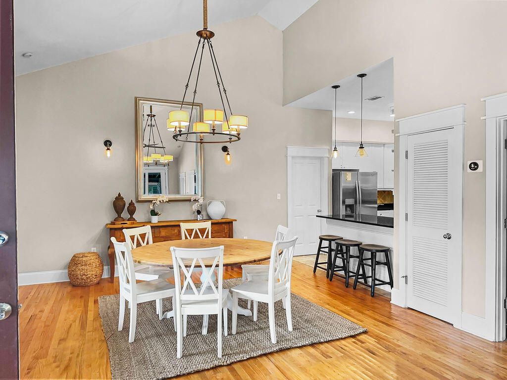 Chandelier, Dining room, Interior, Kitchen, Pendant Lights, Stainless Steel Appliances, Wood Texture Flooring